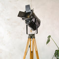 A.E. Cremer Paris 1950s Film Spotlight Floor lamp, Theatre Projector on Wooden Surveying Tripod, Original Barndoors, French Art Deco
