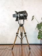 1950s Theater Spotlight Floor lamp A.E. Cremer Paris Projector on Vintage Wooden Surveyor Tripod, With Barndoors, French Antique Lighting