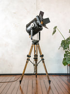 1950s Theater Spotlight Floor lamp A.E. Cremer Paris Projector on Vintage Wooden Surveyor Tripod, With Barndoors, French Antique Lighting