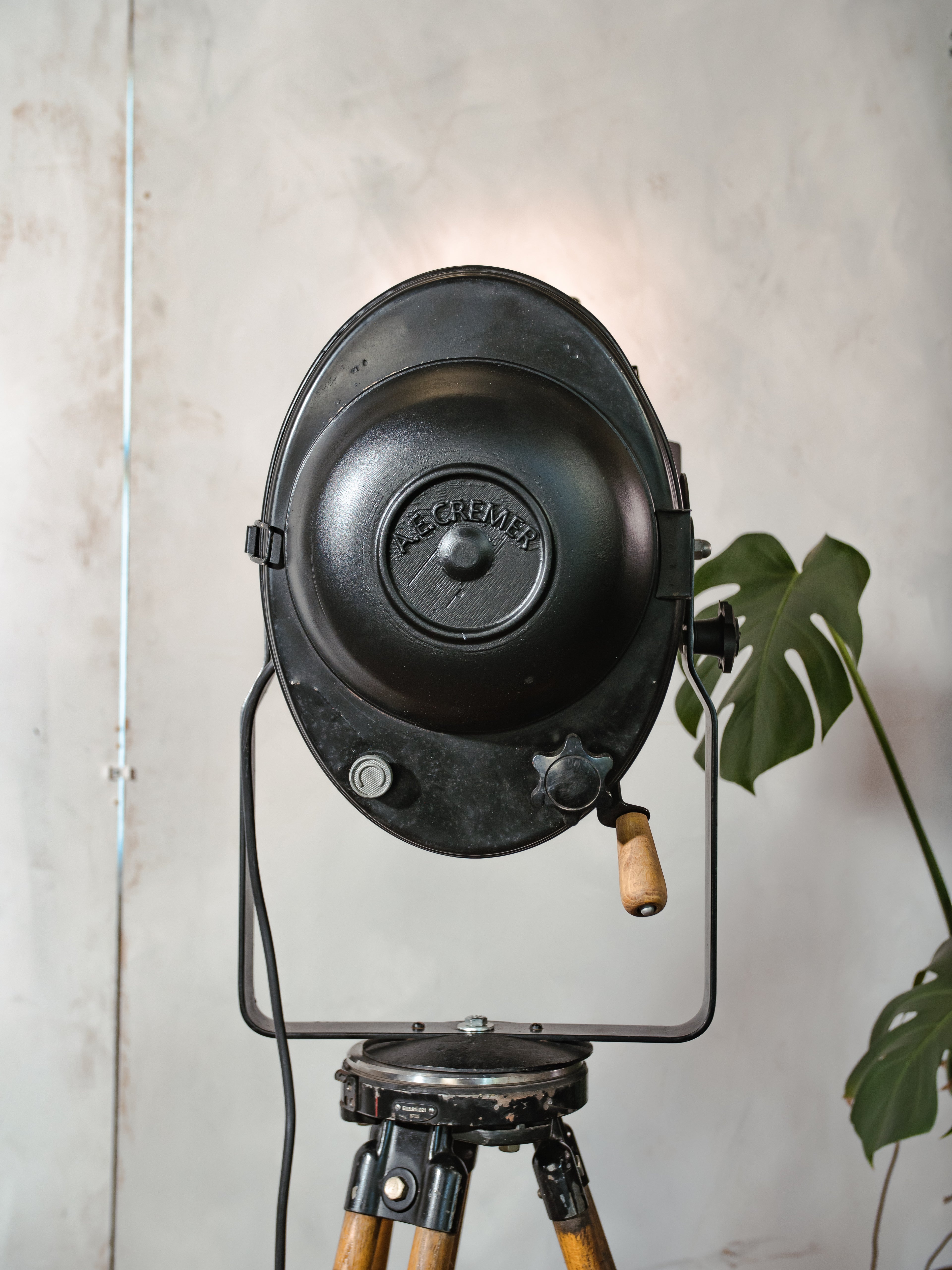 1950s Theater Spotlight Floor lamp A.E. Cremer Paris Projector on Vintage Wooden Surveyor Tripod, With Barndoors, French Antique Lighting