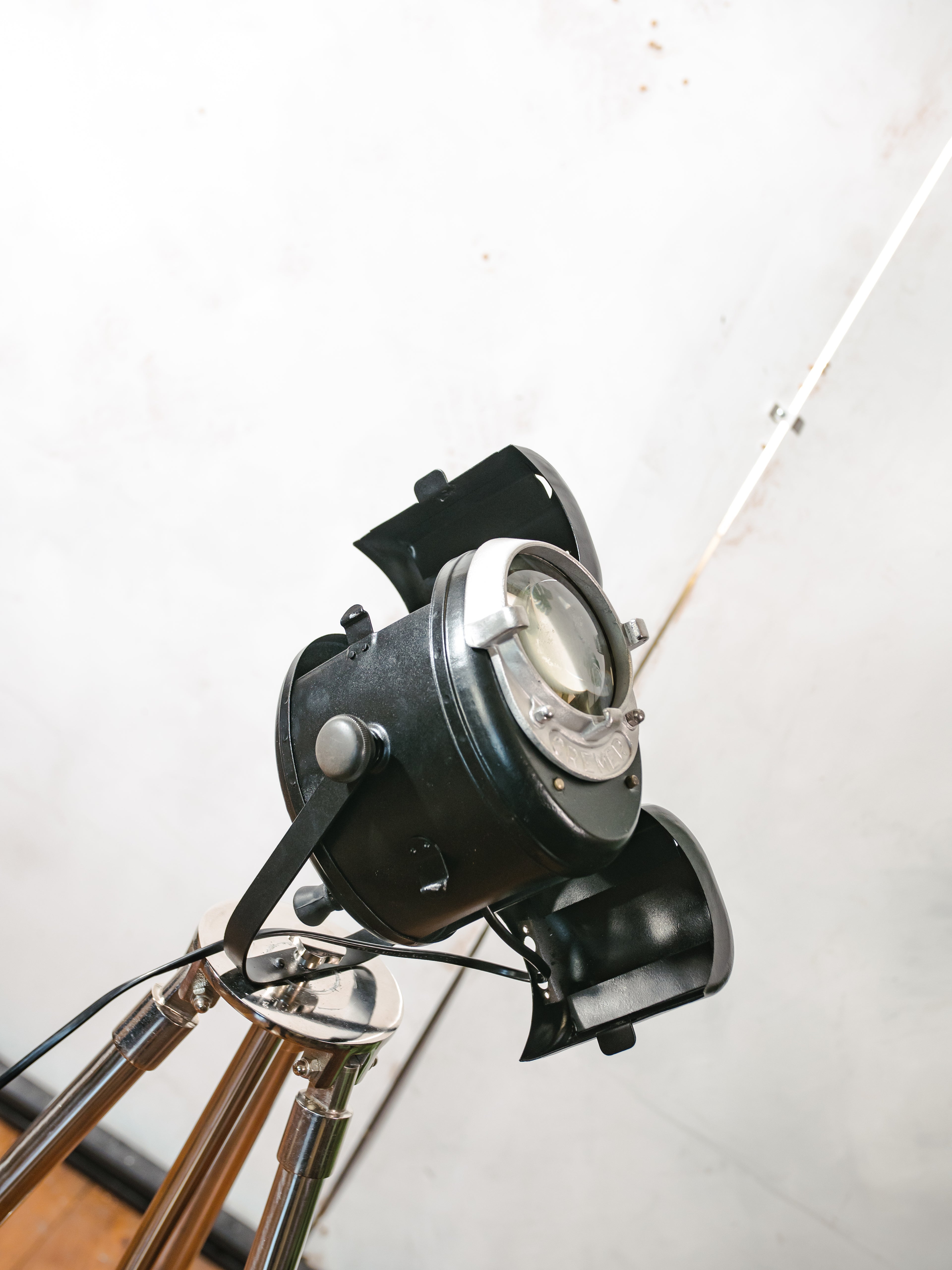 1950s A.E. Cremer Baby spotlight Black Floor lamp, Vintage French Theatre Light on Chrome Tripod, Rare model with two doors