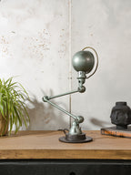 1950s Jieldé Vespa Green 2 Arm French Workshop Lamp on Brake disc, Jielde light, Vintage Designer Desk Lamp by Jean Louis Domecq