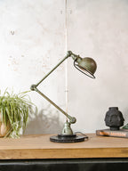 1950s Jieldé Vespa Green 2 Arm French Workshop Lamp on Brake disc, Jielde light, Vintage Designer Desk Lamp made by Jean Louis Domecq