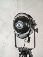 1950s Black A.E. Cremer Paris Industrial Film Spotlight Floor lamp, Mounted on Wooden Surveying Tripod, French Antique Spotlight