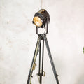 1950s Black A.E. Cremer Paris Industrial Film Spotlight Floor lamp, Mounted on Wooden Surveying Tripod, French Antique Spotlight