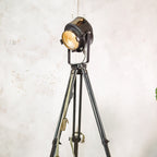 1950s Black A.E. Cremer Paris Industrial Film Spotlight Floor lamp, Mounted on Wooden Surveying Tripod, French Antique Spotlight