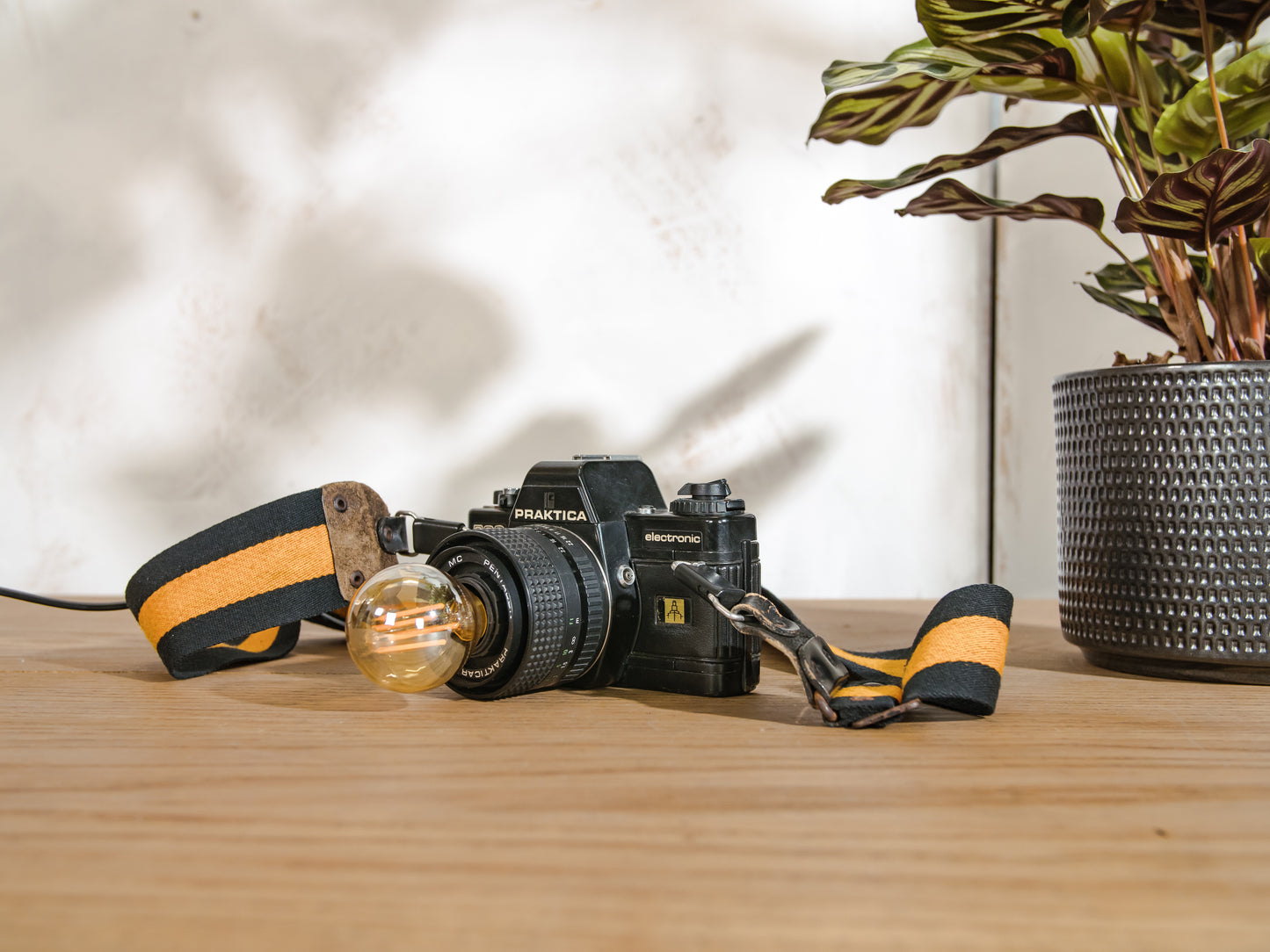 Vintage SLR Camera Desk Lamp, Upcycled Praktica BC3 with Adjustable Strap & LED Bulb Compatibility, Usable as Table lamp and Wall lamp