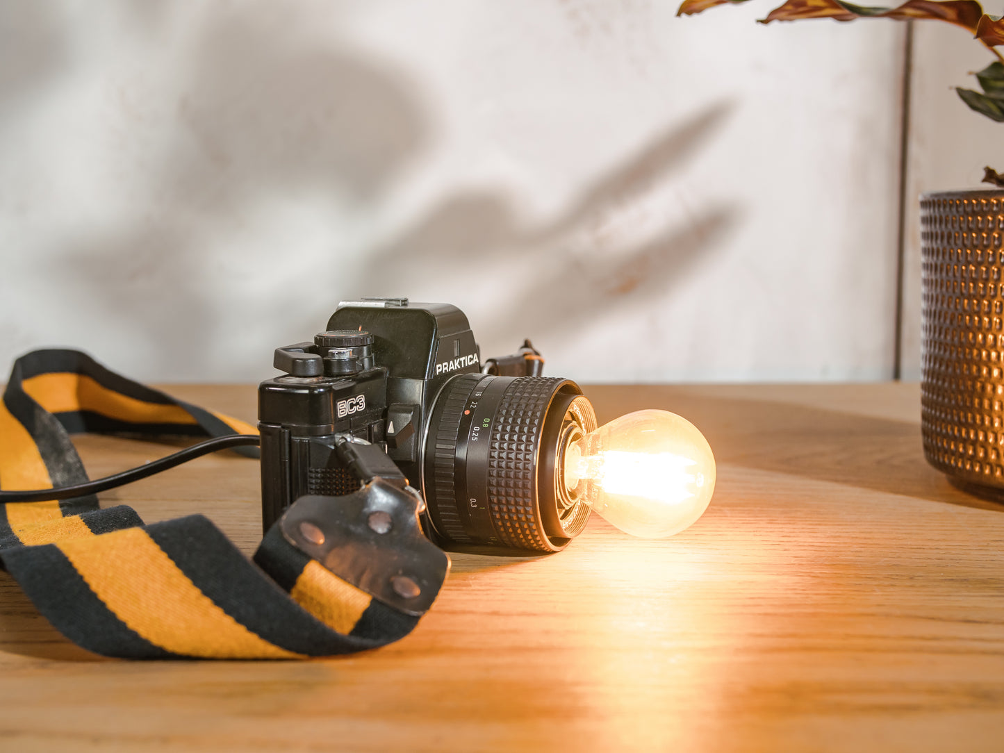 Vintage SLR Camera Desk Lamp, Upcycled Praktica BC3 with Adjustable Strap & LED Bulb Compatibility, Usable as Table lamp and Wall lamp