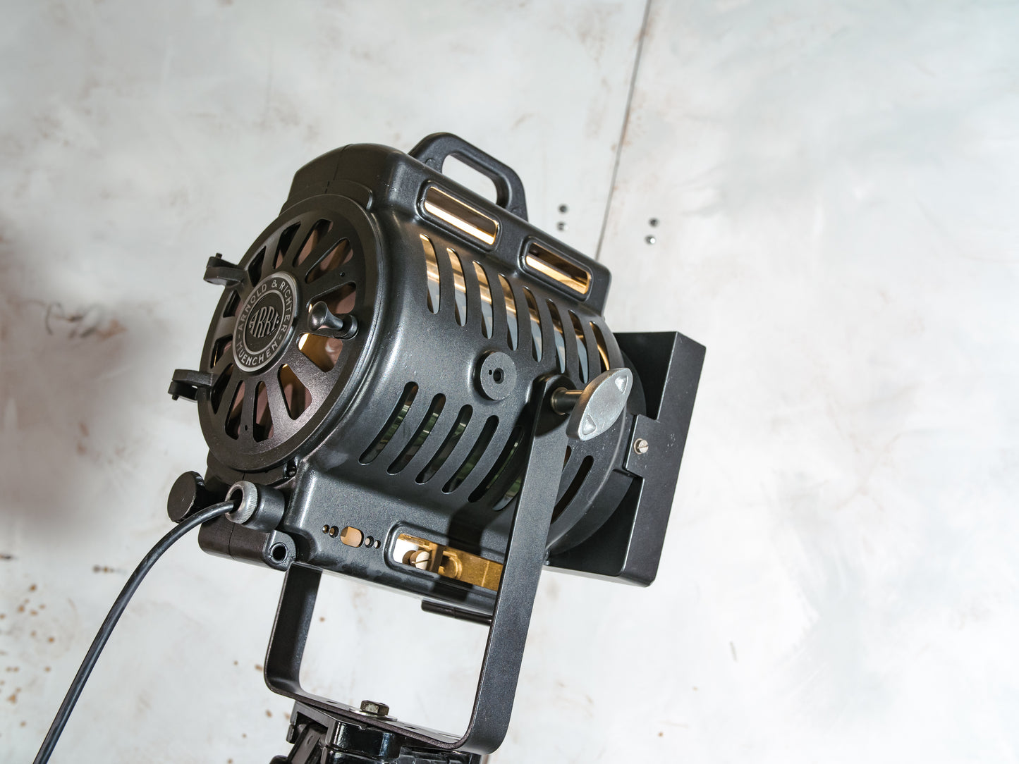 ARRI Cinema Lamp 1950s, Arnold & Richter 500 Watt Fresnel Baby Spotlight, Television lighting on a Black Surveying Tripod, Floorlamp