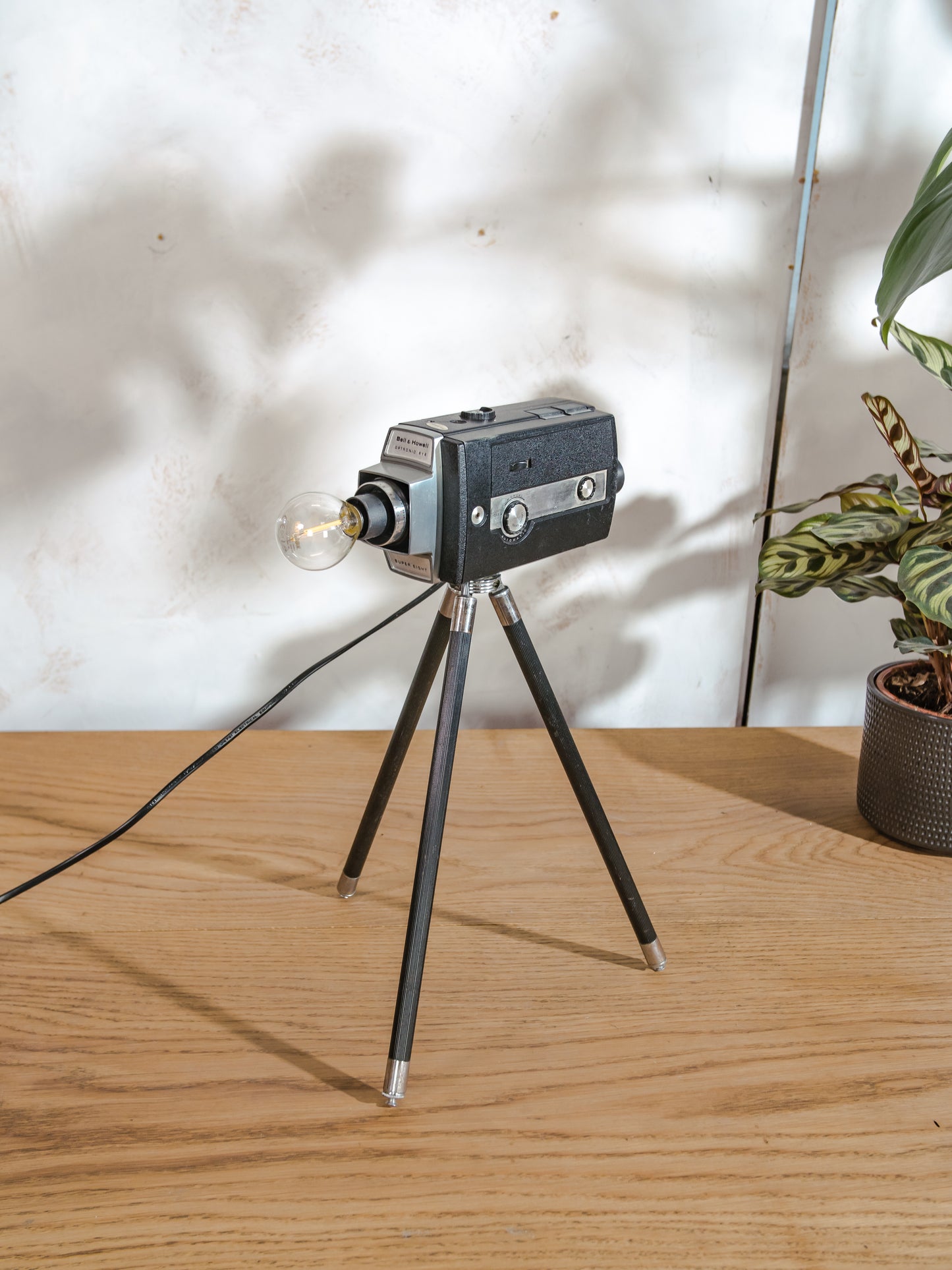 Vintage Bell & Howell Super 8 Film Camera Desk lamp, Upcycled Table lighting on antique Tripod