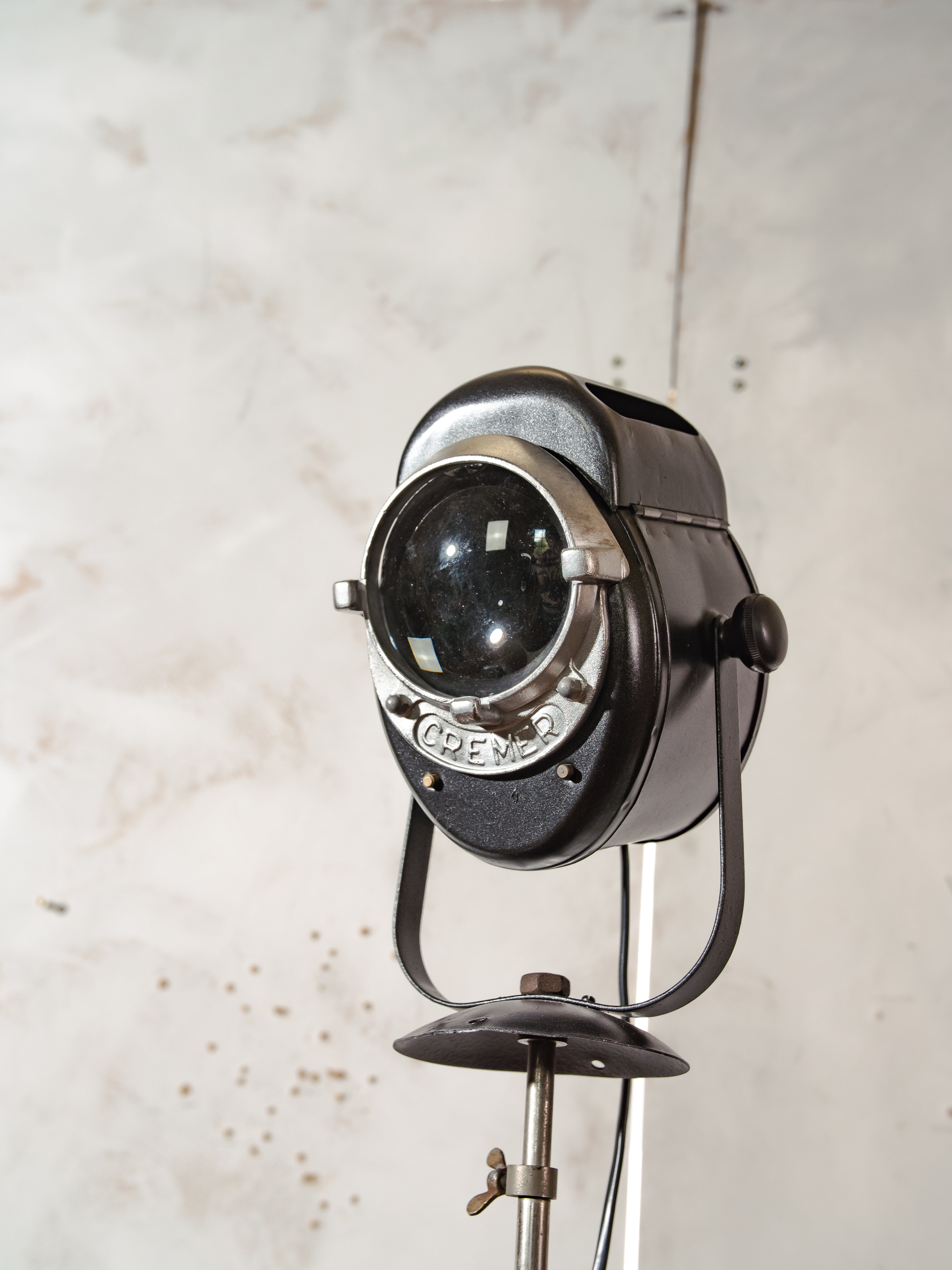 1950s A.E. Cremer Baby spotlight on original Tripod Black Floor lamp, Vintage French Theatre Light Standard Lighting