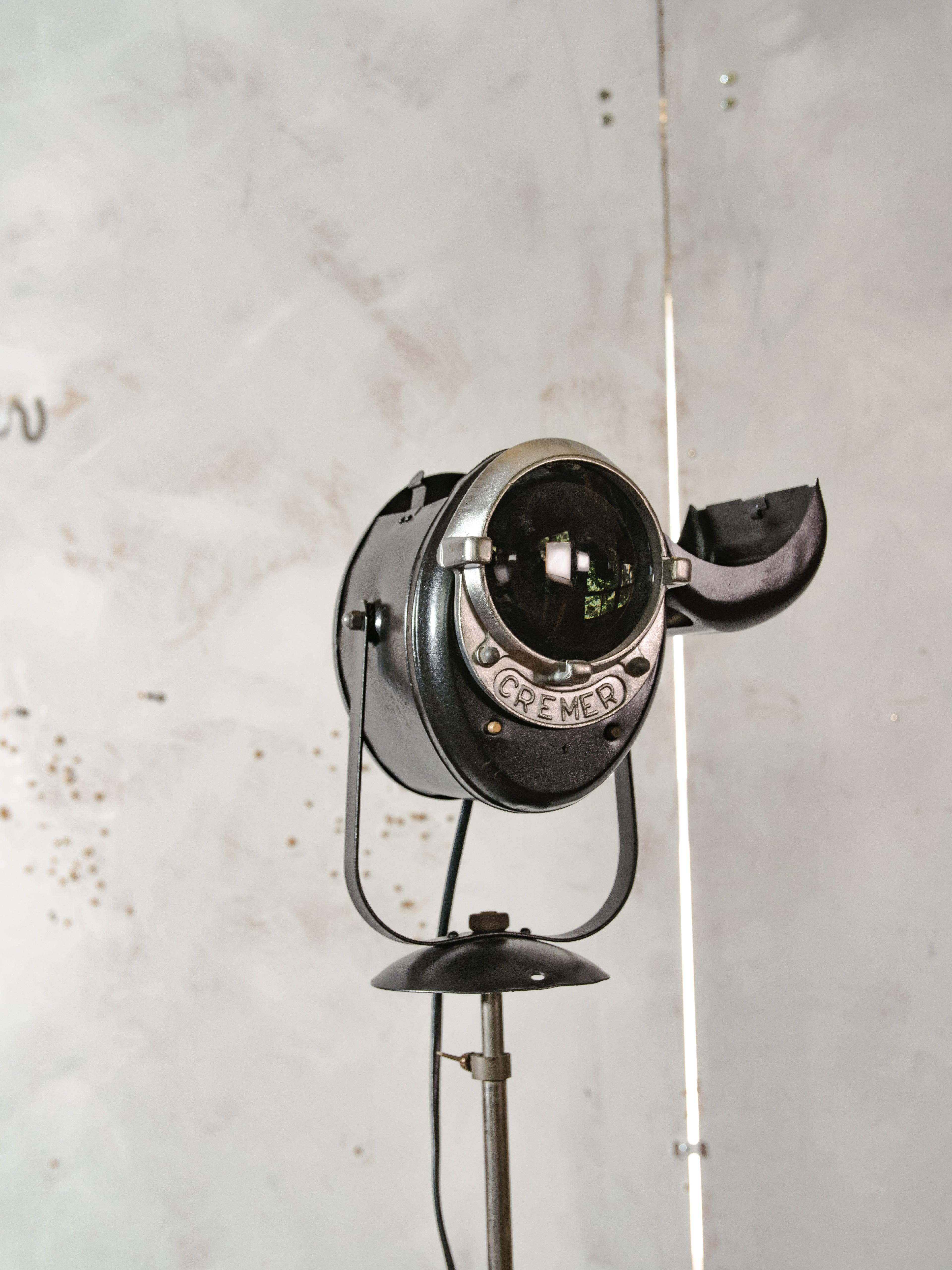 1950s A.E. Cremer Baby spotlight on original Tripod Black Floor lamp, Vintage French Theatre Light Standard Lighting