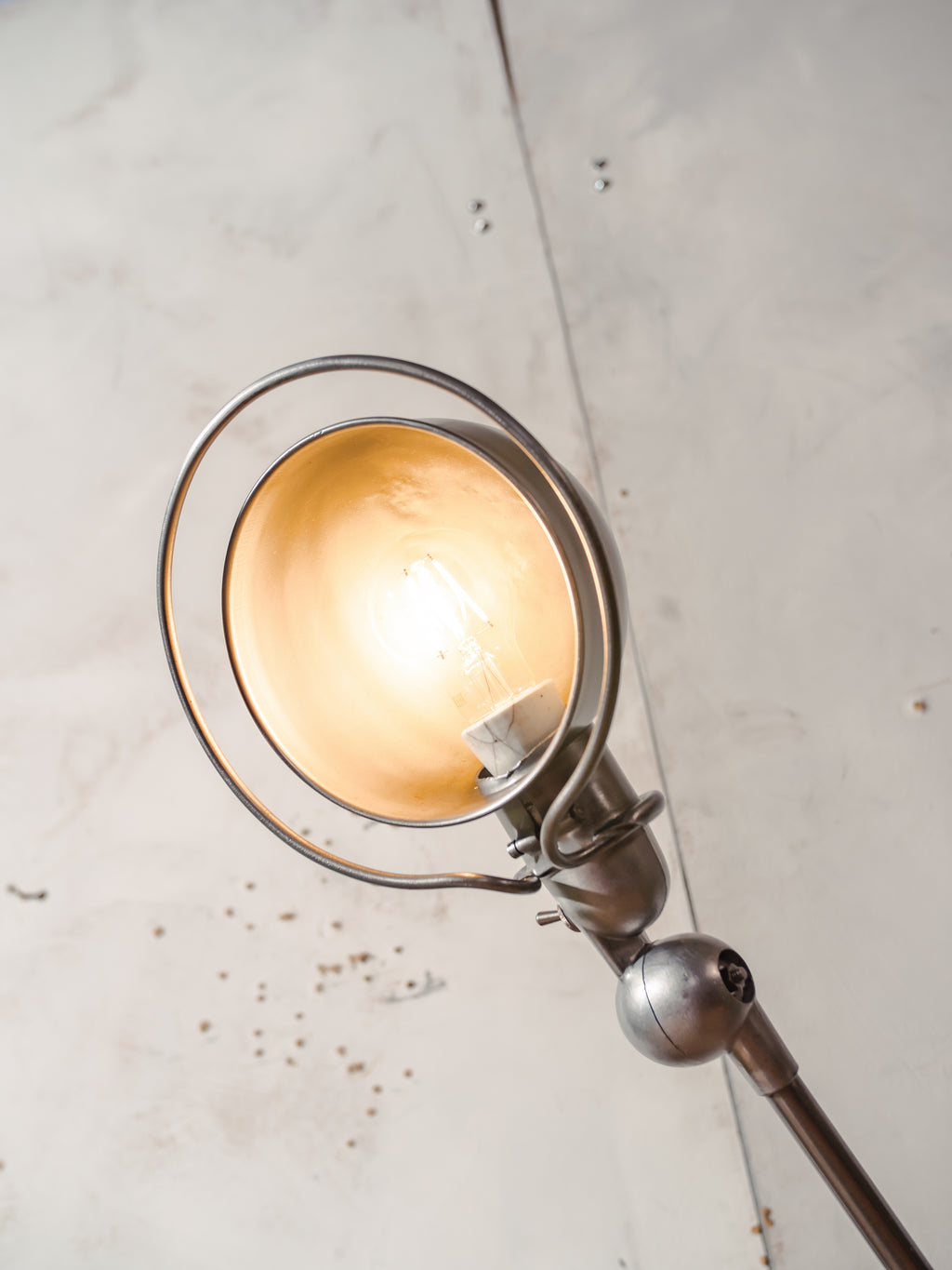 Polished 1950s Jieldé 2 Arm French Workshop Lamp on Brake disc, Jielde light, Vintage Designer Desk Lamp made by Jean Louis Domecq