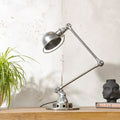 Polished 1950s Jieldé 2 Arm French Workshop Lamp on Brake disc, Jielde light, Vintage Designer Desk Lamp made by Jean Louis Domecq