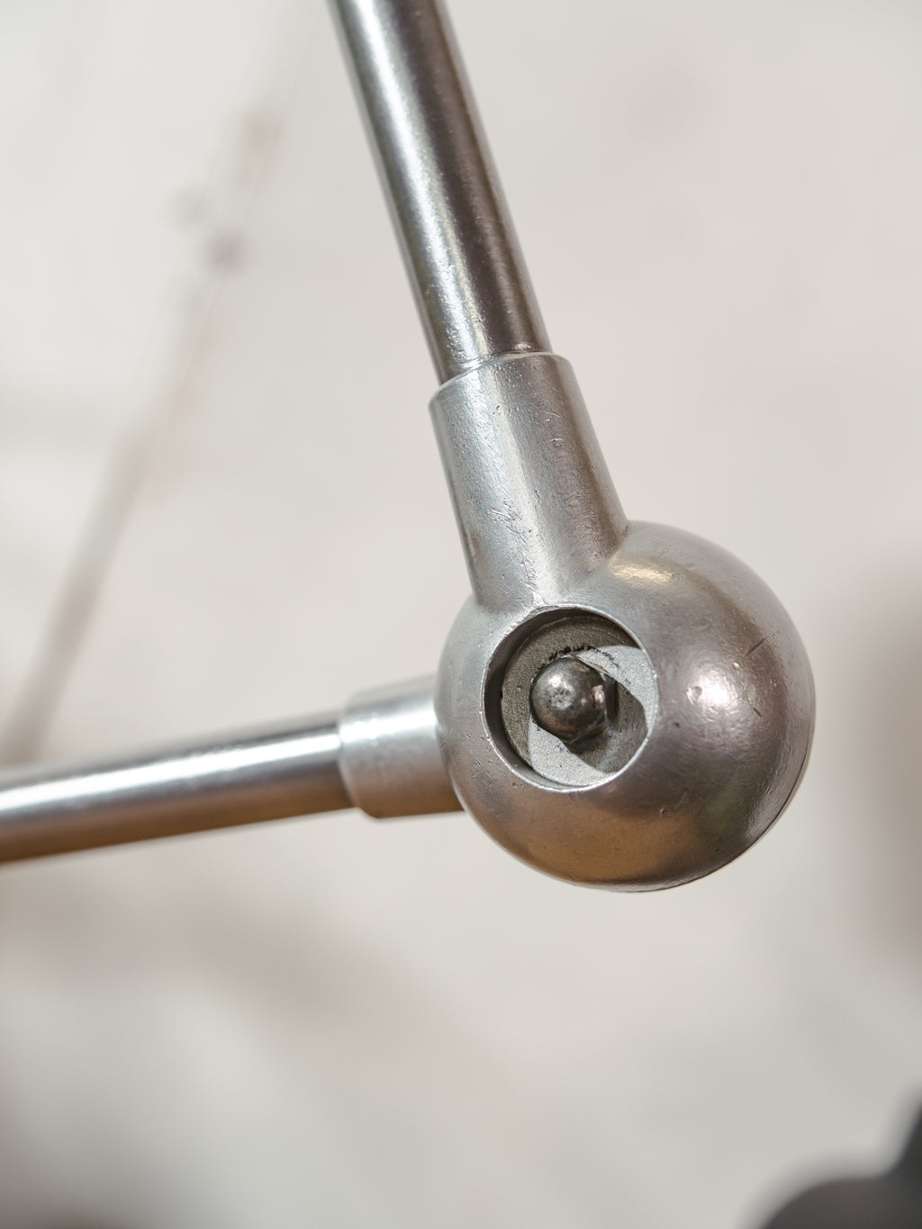 Polished 1950s Jieldé 2 Arm French Workshop Lamp on Brake disc, Jielde light, Vintage Designer Desk Lamp made by Jean Louis Domecq