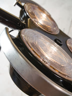 Zwarte staande lamp met 3 standen voor een ziekenhuis, gerecyclede MCM-spot op een statief van houten krukken, retro-operatiekamerverlichting in Loft & Studio