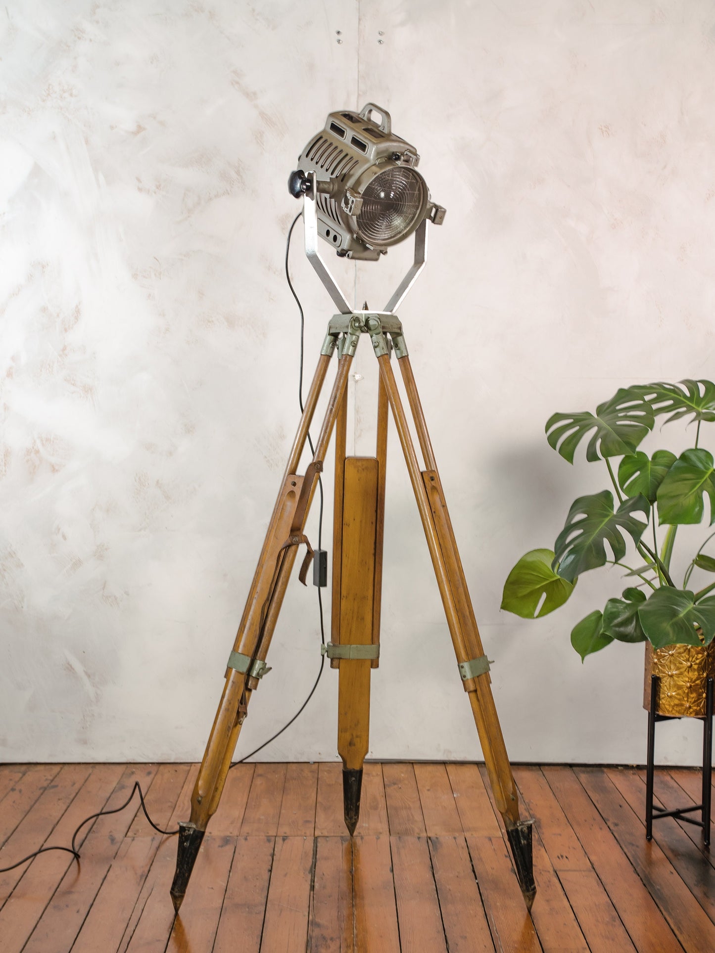 1950s ARRI Arnold & Richter Vintage Hollywood Film Spotlight, German Studio Spot light on a Vintage Wooden Surveyors Tripod