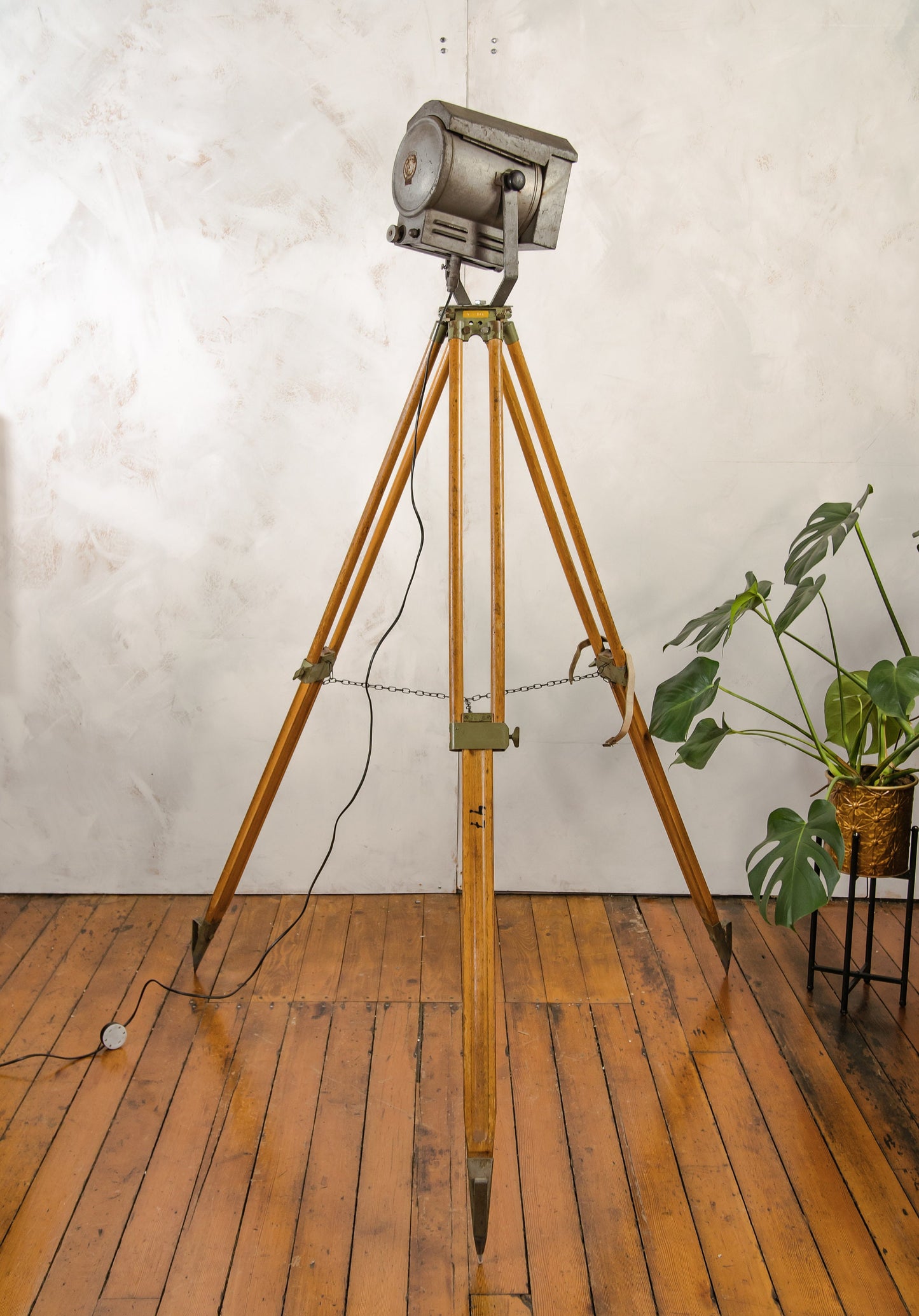 French Theatre Spotlight Floor lamp, Made by Falconet & Cie Paris, Stage light on a Wooden Surveying Tripod, Industrial interior lighting