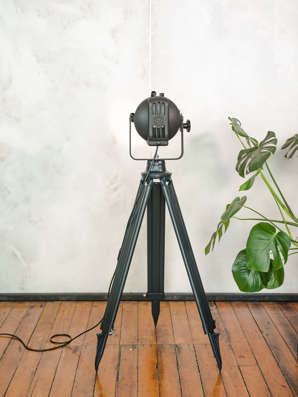 Spotlight Floor lamp 1960s, Black Strand Electric Patt 23 Theatre lamp on Black Surveying Tripod, Art Deco Film studio lighting Hollywood